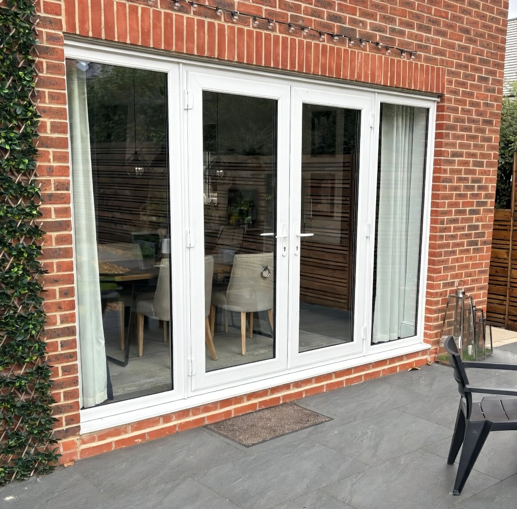 uPVC French doors with sidelights in white